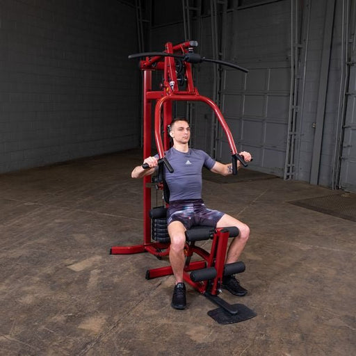 White male athlete performing chest press on the Best Fitness by Body-Solid Single Stack Home Gym BFMG30.