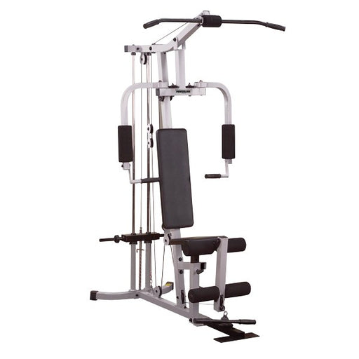 Powerline Home Gym PHG1000X with all stations in use, showing lat pulldown, chest press, leg curl, and more