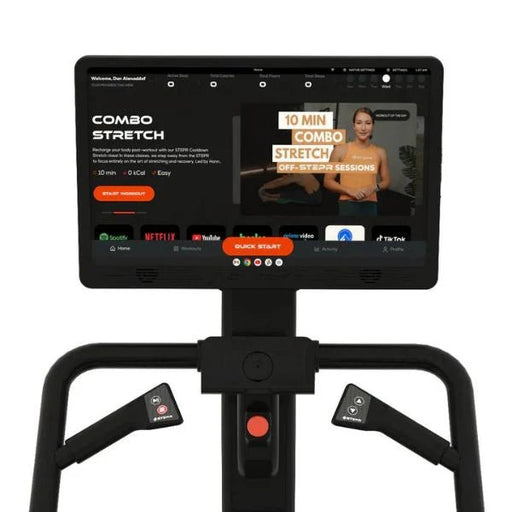 Close-up of the 27" HD touchscreen on the STEPR Pro+ Stair Climber, showing fitness and entertainment options with 360º swivel and pivot capabilities.