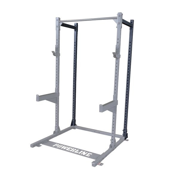 Powerline Half Rack PPR500, four-post setup with pin and pipe safeties for secure and safe weightlifting exercises in a home gym plus spotter arms white background